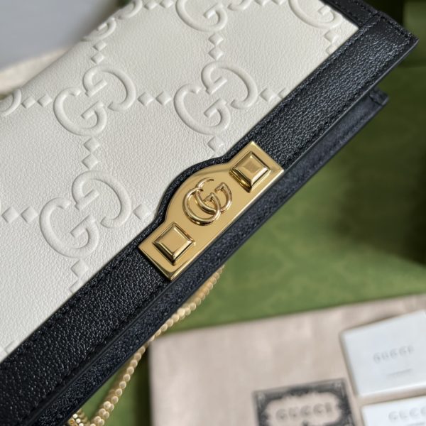 GG Leather clutch