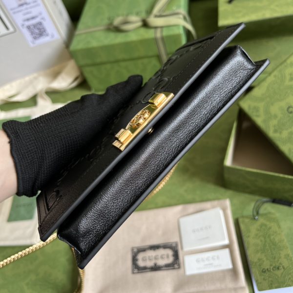 GG Leather clutch