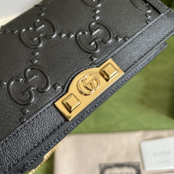 GG Leather clutch