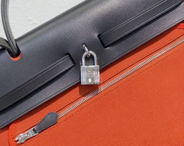 HERMES HERBAG ZIP 31 BAG PALLADIUM HARDWARE ORANGE 31CM