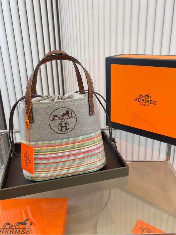 HERMÈS ROTTAN CANVAS WITH LEATHER BUCKET BAG 24CM