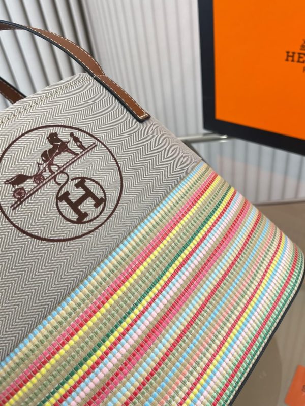 HERMÈS ROTTAN CANVAS WITH LEATHER BUCKET BAG 24CM