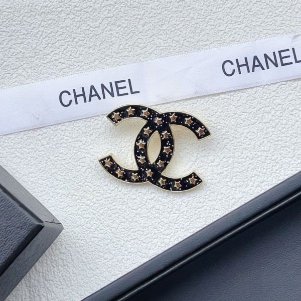 CHANEL CC BROOCH BLACK WITH MANY SMALL STARS