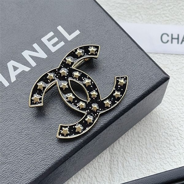 CHANEL CC BROOCH BLACK WITH MANY SMALL STARS