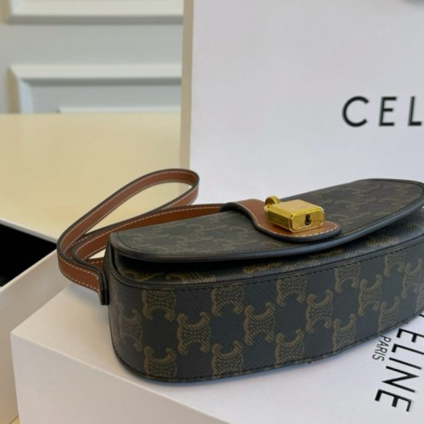 CELINE CLUTCH ON STRAP TABOU IN TRIOMPHE CANVAS AND CALFSKIN TAN 20CM 10I592DQ2 04LU