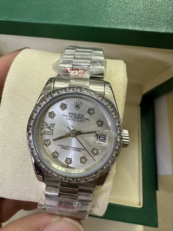 ROLEX DATEJUST DIAMOND BEZEL OYSTER WHITE GOLD PURPLE 31MM