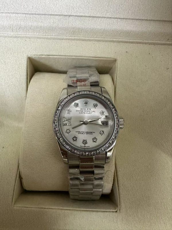ROLEX DATEJUST DIAMOND BEZEL OYSTER WHITE GOLD PURPLE 31MM