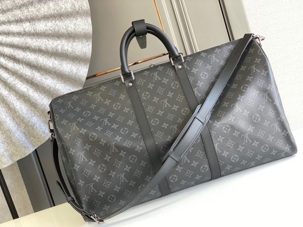 SUMMER SET: LOUIS VUITTON KEEPALL BANDOULIÈRE 50 MONOGRAM ECLIPSE & LONG WALLET MONOGRAM ECLIPSE TRUNK ZIPPY BLACK 19CM