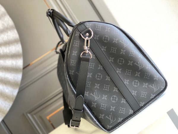 SUMMER SET: LOUIS VUITTON KEEPALL BANDOULIÈRE 50 MONOGRAM ECLIPSE & LONG WALLET MONOGRAM ECLIPSE TRUNK ZIPPY BLACK 19CM