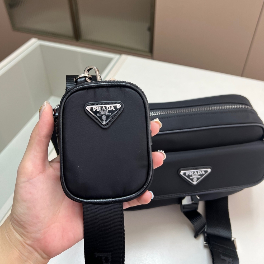 PRADA RE NYLON AND SAFFIANO LEATHER SHOULDER BAG BLACK 24CM 2VH133 2DMH F0002 XMP PRADA RE NYLON AND SAFFIANO LEATHER SHOULDER BAG BLACK 24CM 2VH133 2DMH F0002 XMP