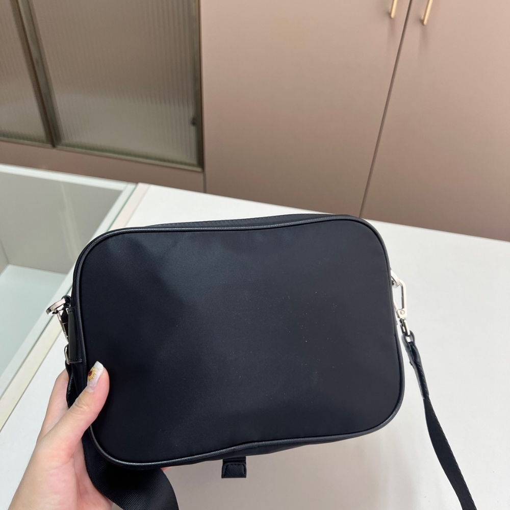 PRADA RE NYLON AND SAFFIANO LEATHER SHOULDER BAG BLACK 24CM 2VH133 2DMH F0002 XMP PRADA RE NYLON AND SAFFIANO LEATHER SHOULDER BAG BLACK 24CM 2VH133 2DMH F0002 XMP