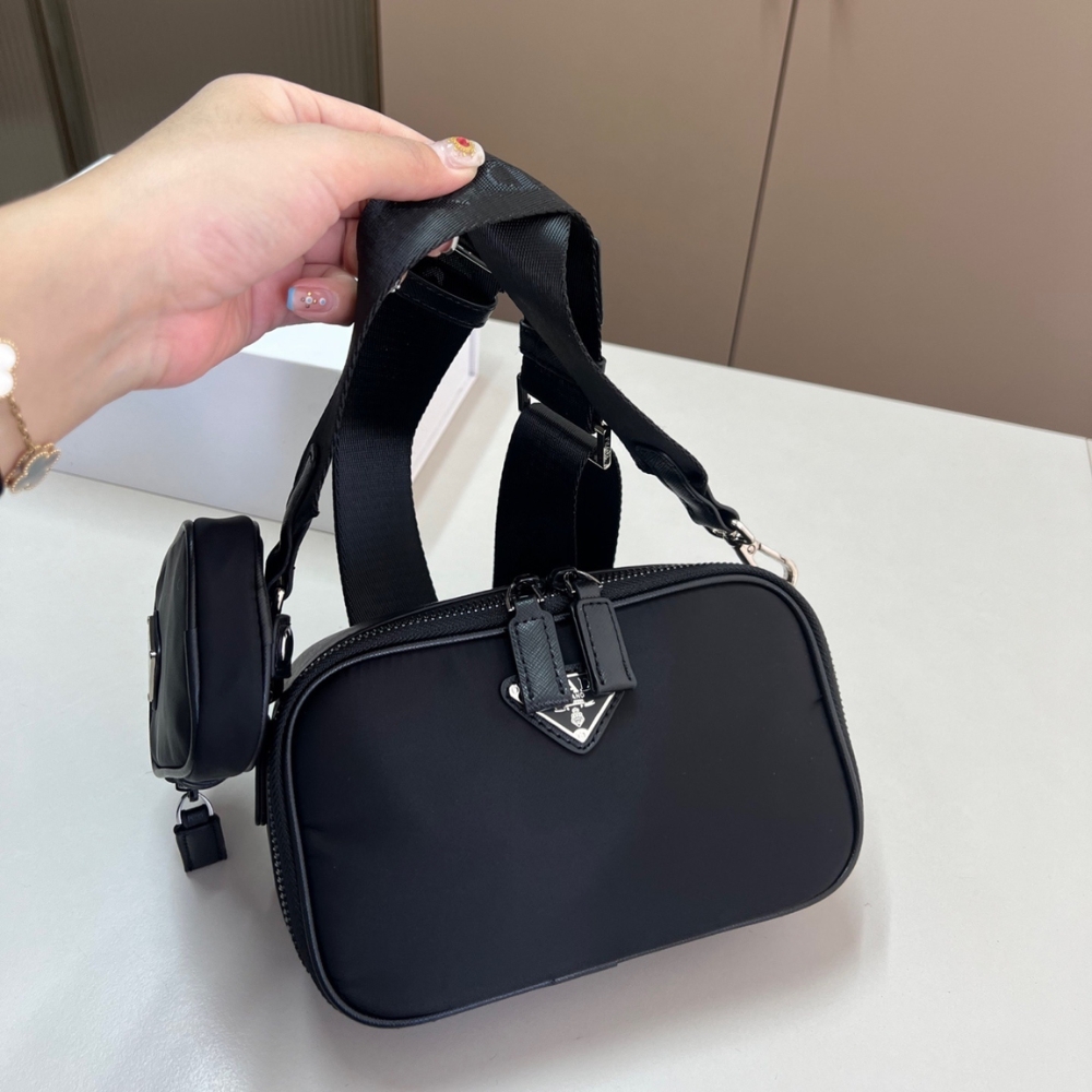 PRADA BRIQUE RE NYLON AND SAFFIANO LEATHER BAG BLACK 20CM 2VH070 2DMH F0002 V XMP PRADA BRIQUE RE NYLON AND SAFFIANO LEATHER BAG BLACK 20CM 2VH070 2DMH F0002 V XMP