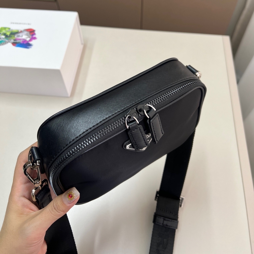 PRADA BRIQUE RE NYLON AND SAFFIANO LEATHER BAG BLACK 20CM 2VH070 2DMH F0002 V XMP PRADA BRIQUE RE NYLON AND SAFFIANO LEATHER BAG BLACK 20CM 2VH070 2DMH F0002 V XMP