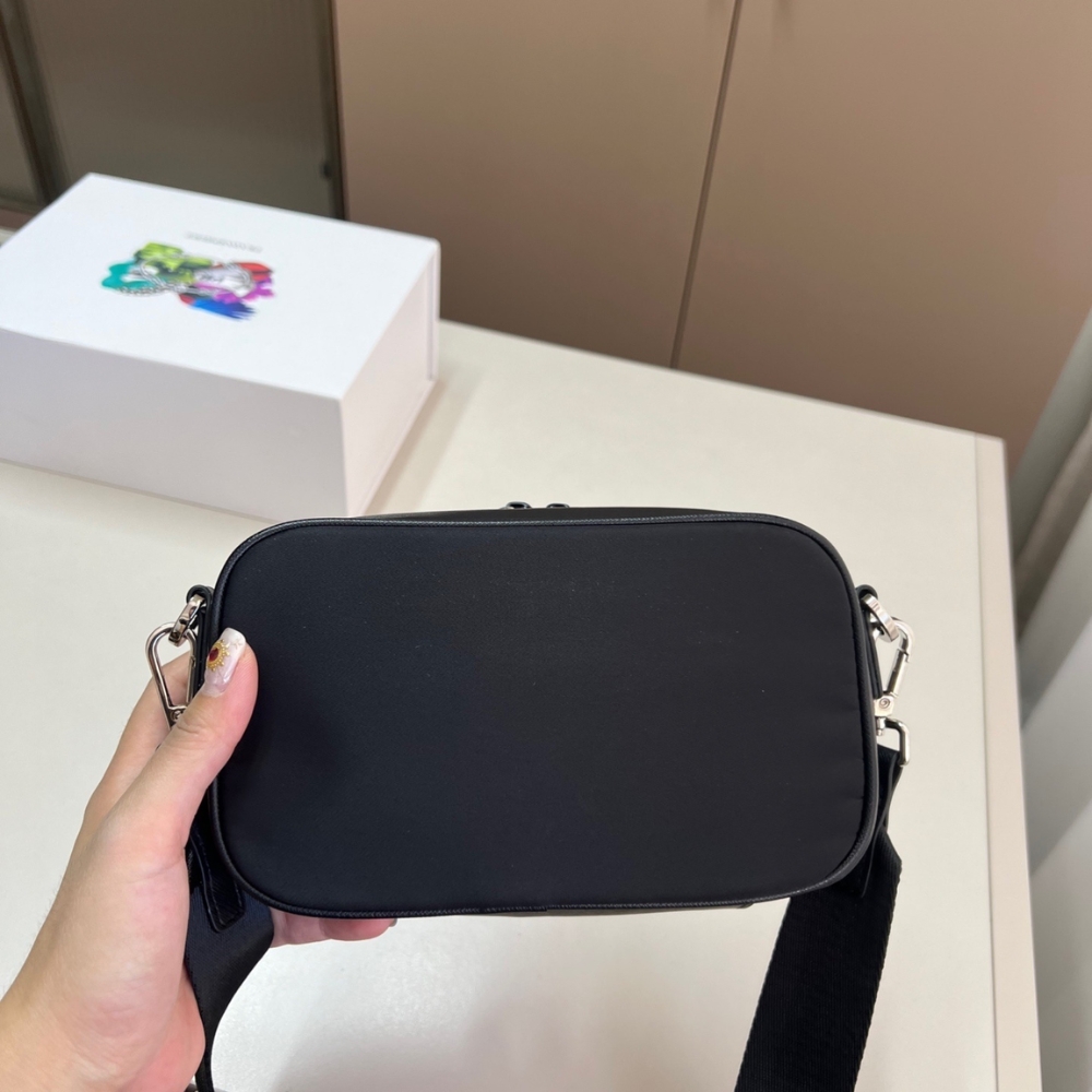 PRADA BRIQUE RE NYLON AND SAFFIANO LEATHER BAG BLACK 20CM 2VH070 2DMH F0002 V XMP PRADA BRIQUE RE NYLON AND SAFFIANO LEATHER BAG BLACK 20CM 2VH070 2DMH F0002 V XMP