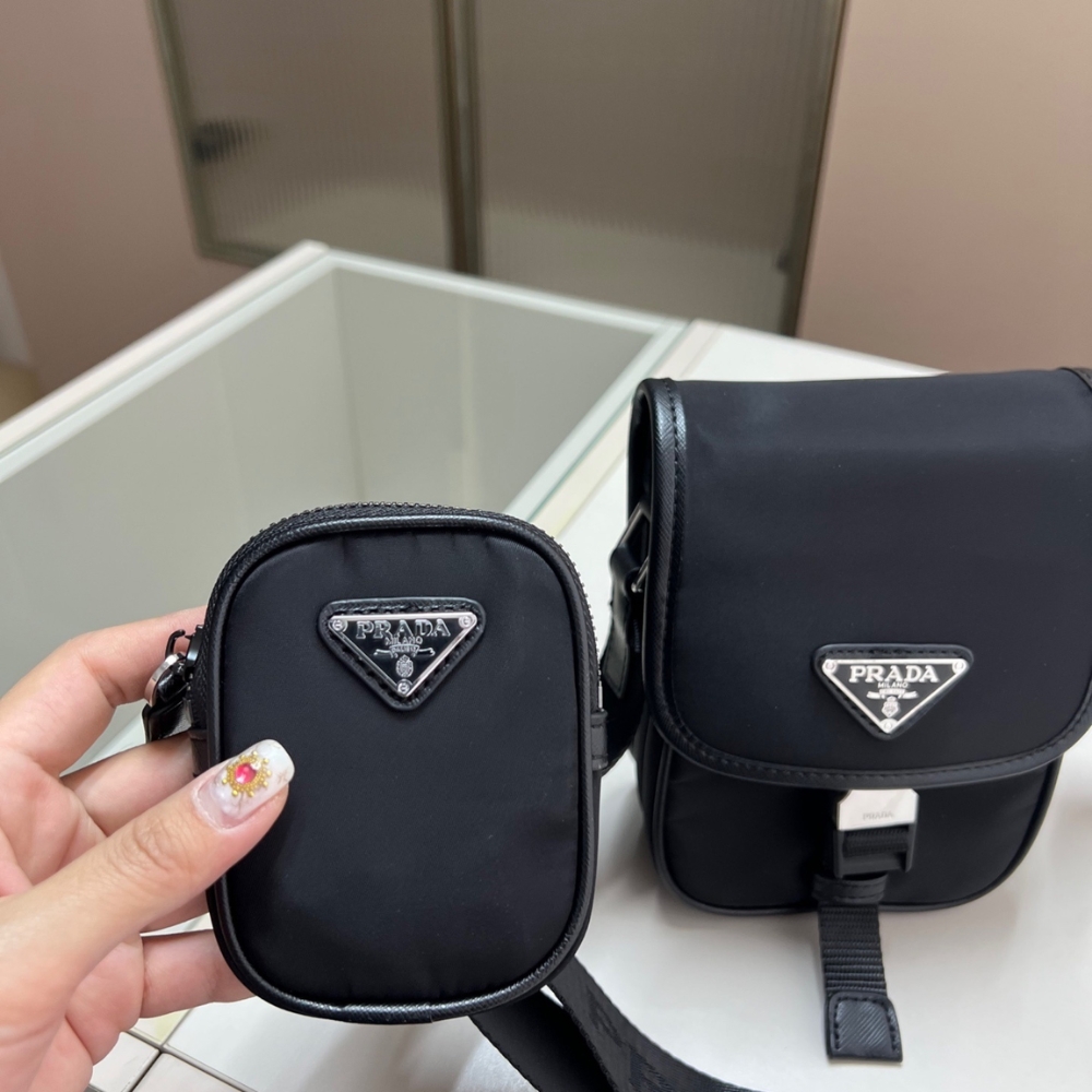 PRADA RE NYLON AND SAFFIANO LEATHER SHOULDER BAG BLACK 17CM 2VH112 2DMH F0002 V WOP PRADA RE NYLON AND SAFFIANO LEATHER SHOULDER BAG BLACK 17CM 2VH112 2DMH F0002 V WOP