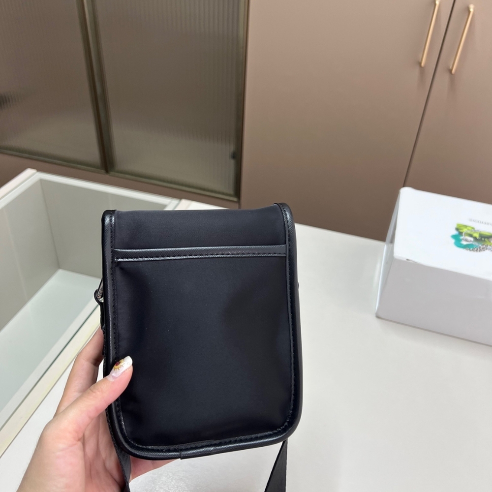 PRADA RE NYLON AND SAFFIANO LEATHER SHOULDER BAG BLACK 17CM 2VH112 2DMH F0002 V WOP PRADA RE NYLON AND SAFFIANO LEATHER SHOULDER BAG BLACK 17CM 2VH112 2DMH F0002 V WOP