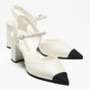 Chanel white slingbacks heels