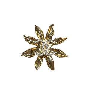 CHANEL BROOCH METAL GOLD AND CRYSTAL