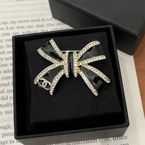 CHANEL BROOCH METAL RESIN AND STRASS GOLD