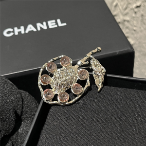 CHANEL BROOCH METAL GLASS AND STRASS GOLD