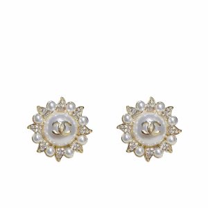 CHANEL SUNBURST PEARL AND CRYSTAL EARRINGS IN GOLD TONE